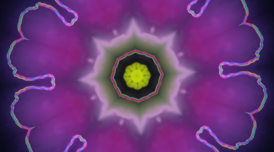 Oil and ink in magenta and yellow, mirrored into an eight-part flower
